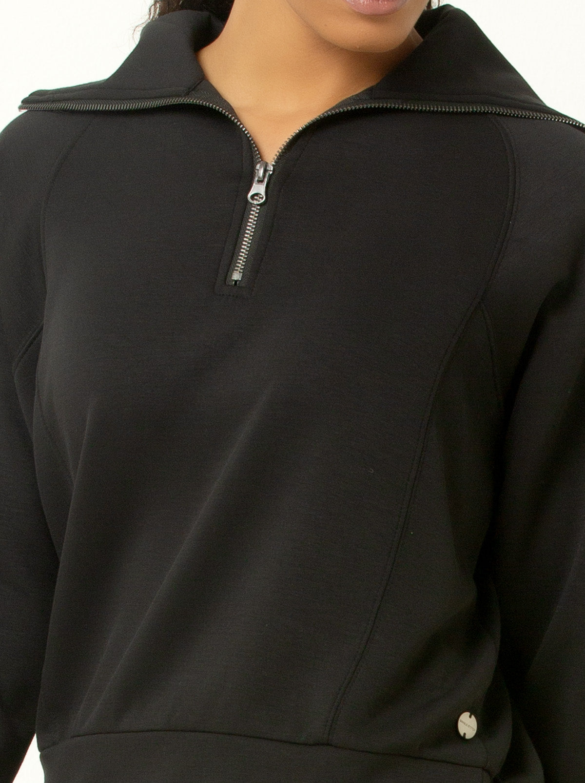 close up shot of female model quarter zip black colored pullover sweatshirt